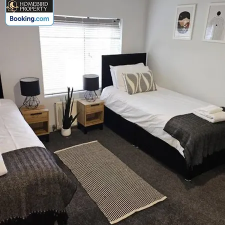 Spacious 3-bedroom Semi Detached House By Homebird Management Short Lets & Serviced With Private Parking & Garden Holiday home *